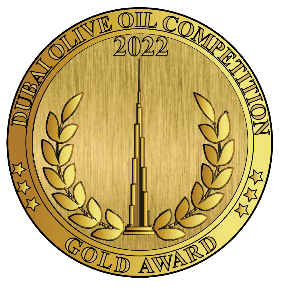 Medalha dourada com ilustração arquitetônica indicando o prêmio Gold Award na Dubai Olive Oil Competition de 2022 para o Azeite Potenza Blend Frutado.