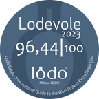 Selo redondo azul do guia internacional Lodo Milano IOOC 2023, exibindo a nota de excelência 96,44 de 100 conquistada pelo Azeite Potenza Blend Intenso.
